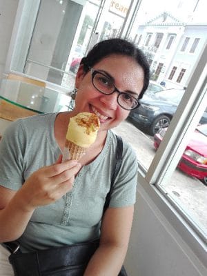 Author Delise Torres eating ice cream